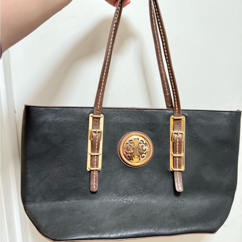 Black and Brown Tote with Gold Emblem and Leather Straps